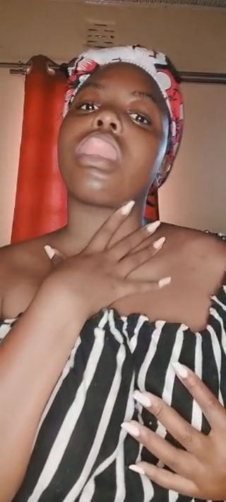 Big tits African mom feeling herself.