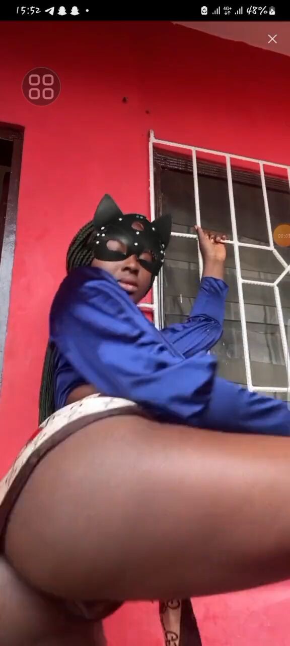 Black pussy slut in a short revealing skirt.