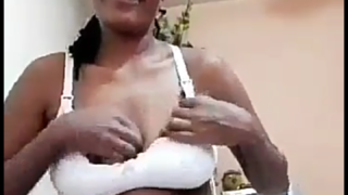 Horny mature mzansi woman in white dress & panties.