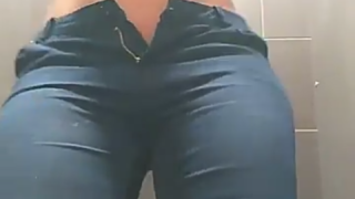 Pudding Pott teasing in a public bathroom video.